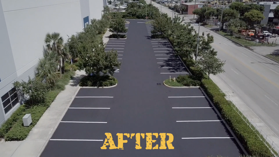 After: freshly paved and striped parking lot, a G&M Paving project